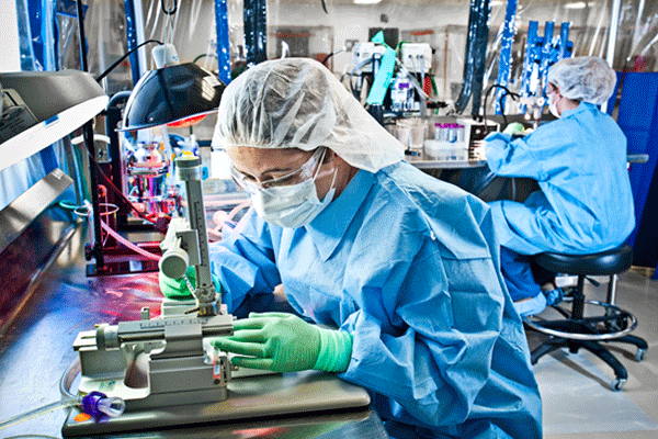 Attentive scientist working inside of a lab 